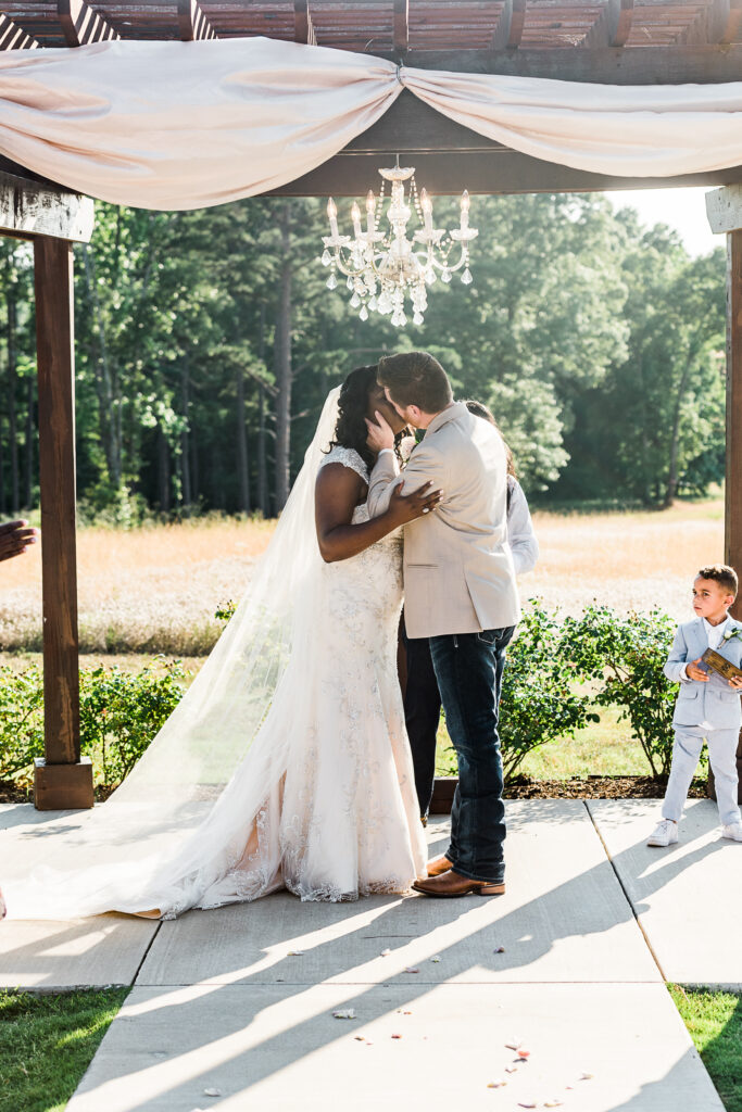 First Kiss Belle Vue Wedding Venue in Tyler, TX by Sulphur Springs Photographer, Candace Pair